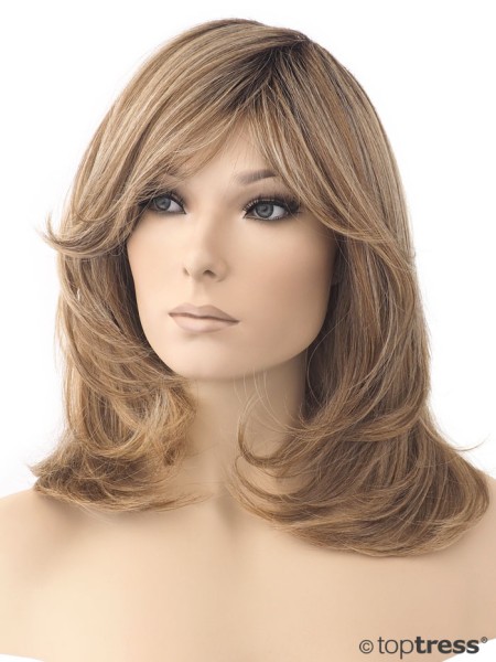 Perücke Tessa Thermosilk® blonder Mix mit dunkel- / hellblonden Highlights und dunklerem Ansatz